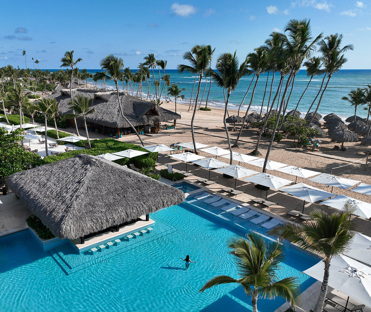 Overview of the pool, beach, and ocean at Finest Punta Cana